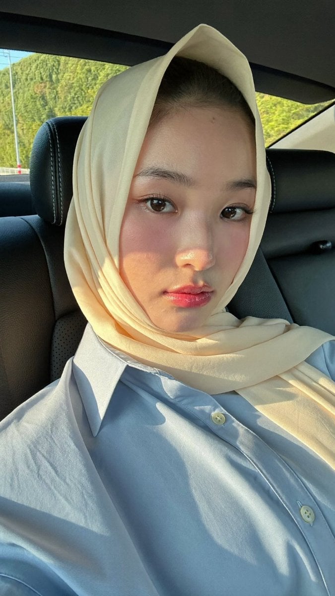 Portrait of Woman in Car with Hijab GPT Image 2.5 preview