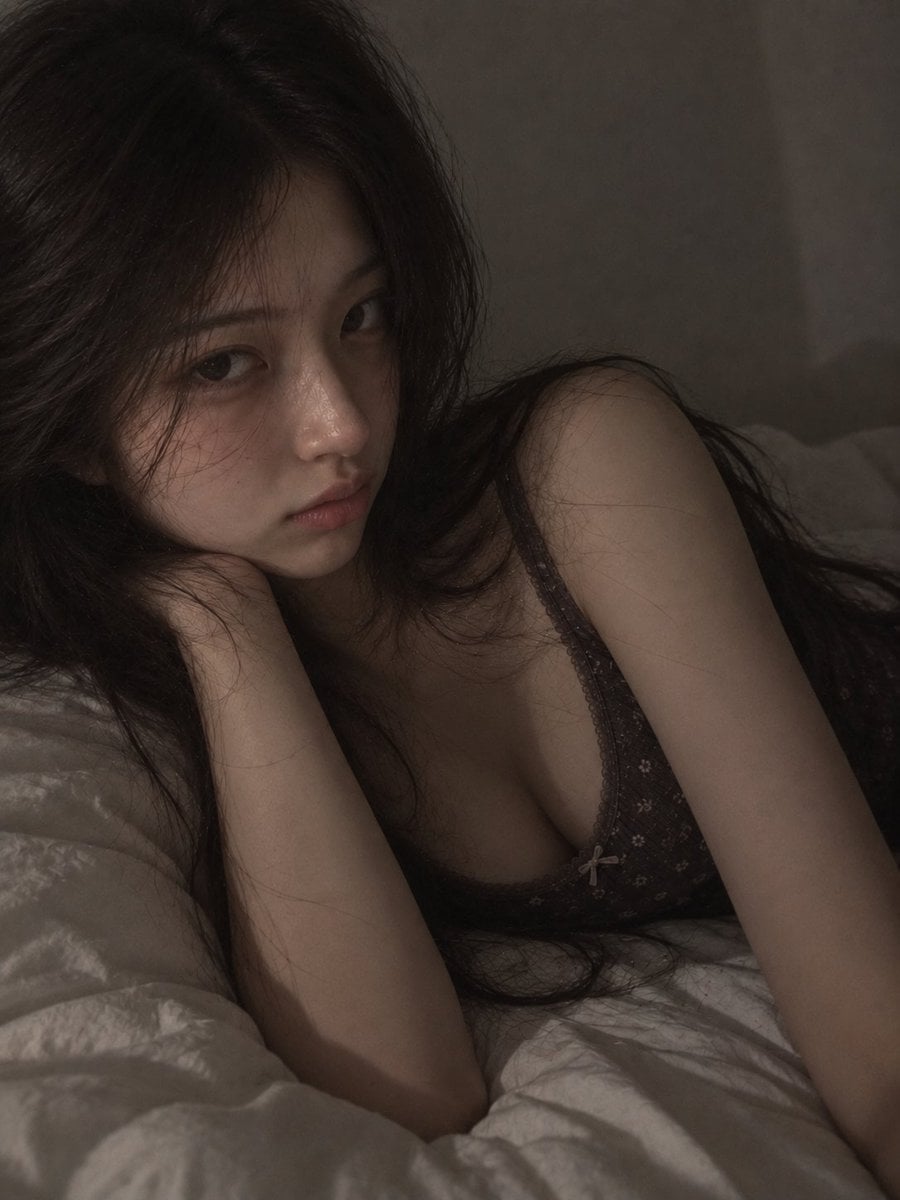 Portrait of Woman Reclining in Dim Bedroom GPT Image 2.5 preview