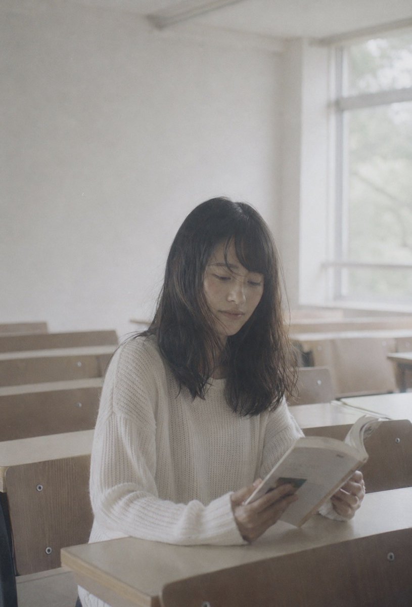 Faceless Student Reading in Classroom preview image