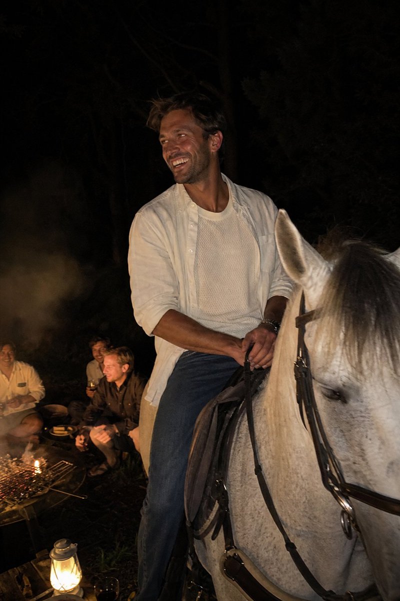 Candid Night Horseback Campfire Photo preview image