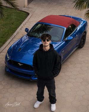 A cinematic portrait of a man with Ford Mustang - preview image