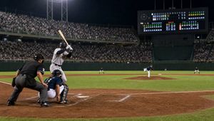 Nighttime baseball pitching scene preview image